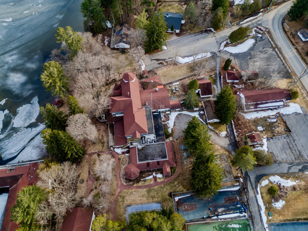 Aerial view of the historic Clevelands House resort buildings and surrounding structures in Minett, showing the aging hotel complex that is planned for demolition under the new Clevelands House Minett development.