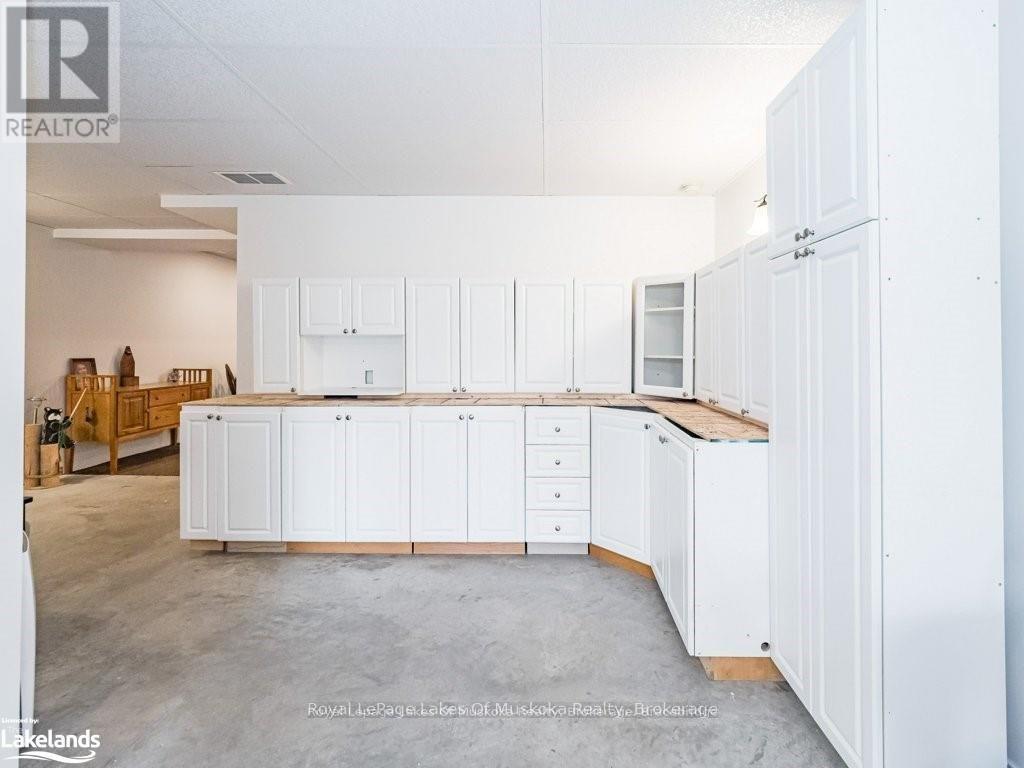 2411 Hwy. 118 E. Highway, Bracebridge, Ontario  P1L 1X1 - Photo 24 - X12123592