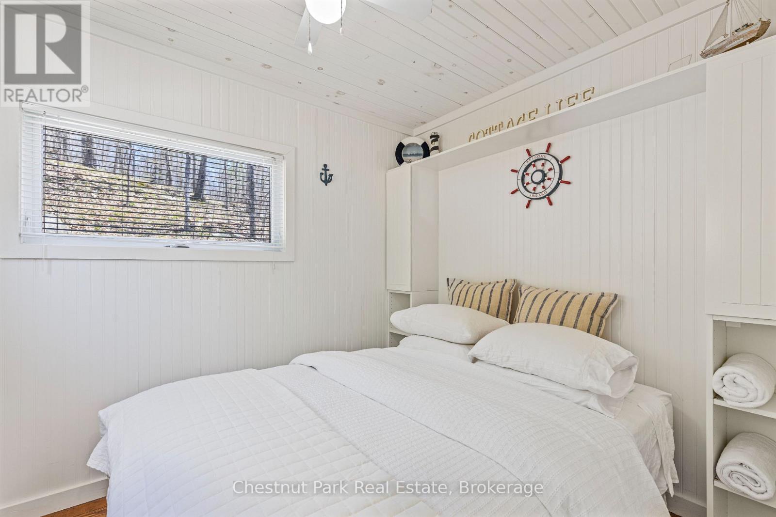 1017 Dark Bay Road, Muskoka Lakes, Ontario  P0C 1A0 - Photo 10 - X12370948