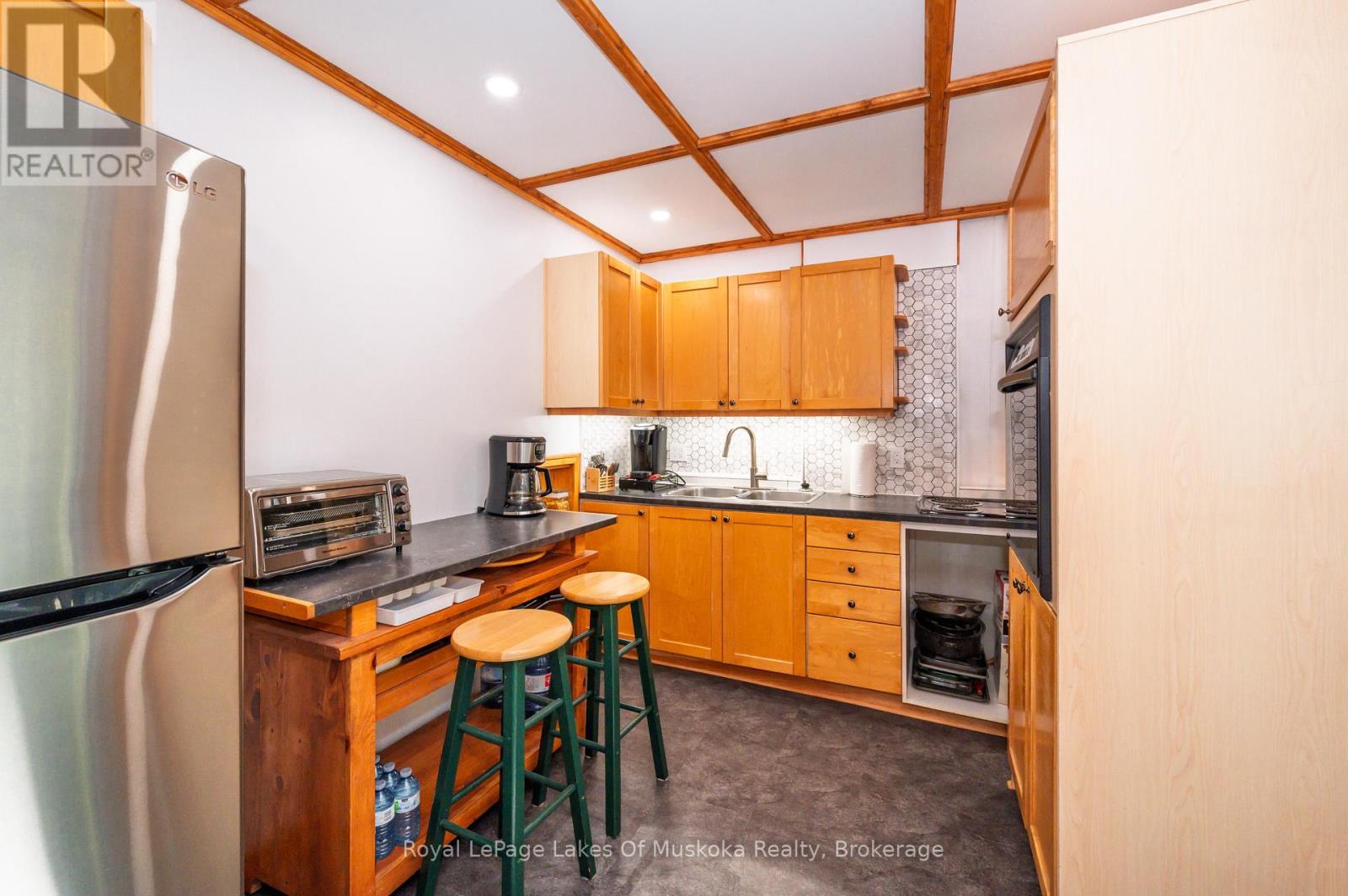 779 Old Muskoka Road, Huntsville, Ontario  P0B 1M0 - Photo 12 - X12378217