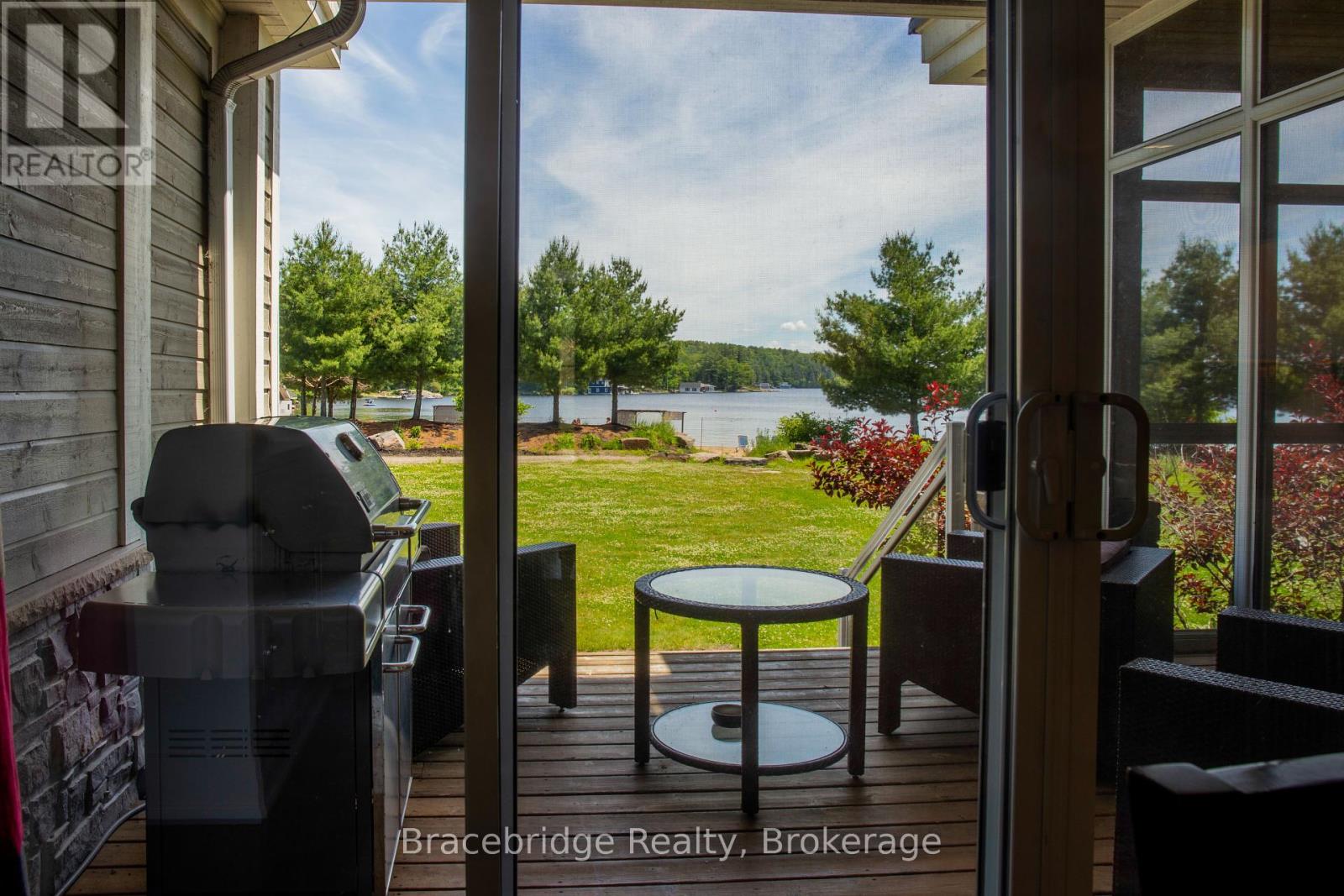 G103-D1 - 1869 Muskoka 118 Highway W, Muskoka Lakes, Ontario  P1L 1W8 - Photo 2 - X12418050