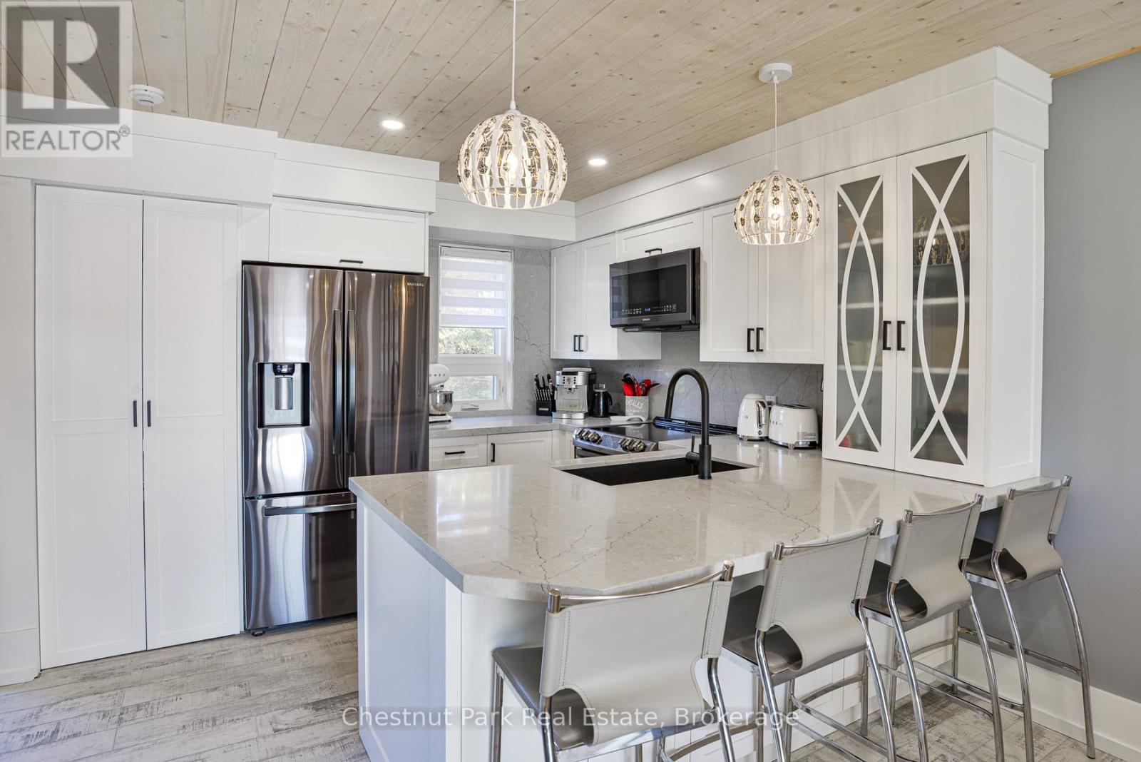 4 Turner Drive, Huntsville, Ontario  P1H 1A8 - Photo 10 - X12425458