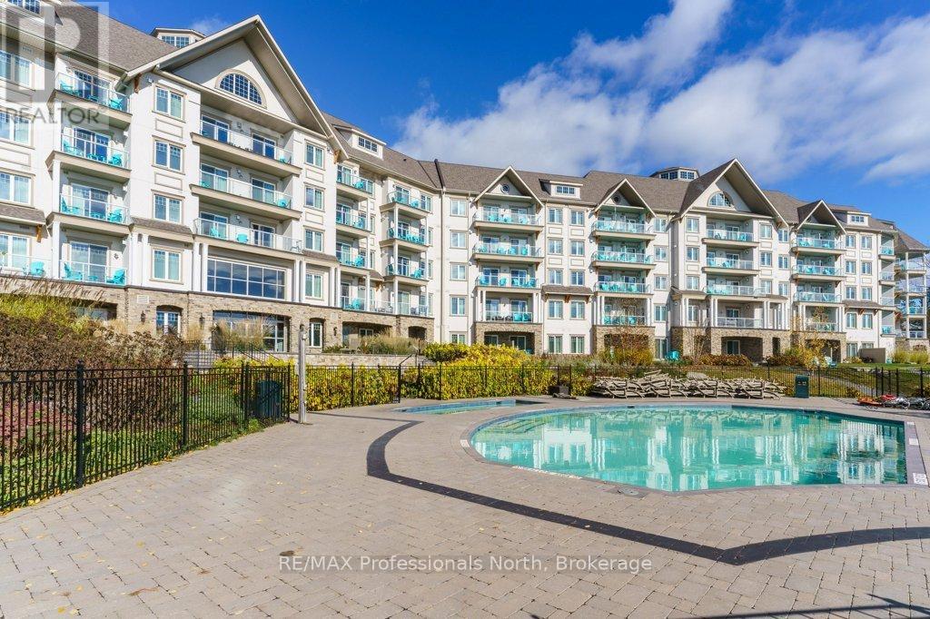 100 - 25 Pen Lake Point Road, Huntsville, Ontario  P1H 1A9 - Photo 2 - X12453981