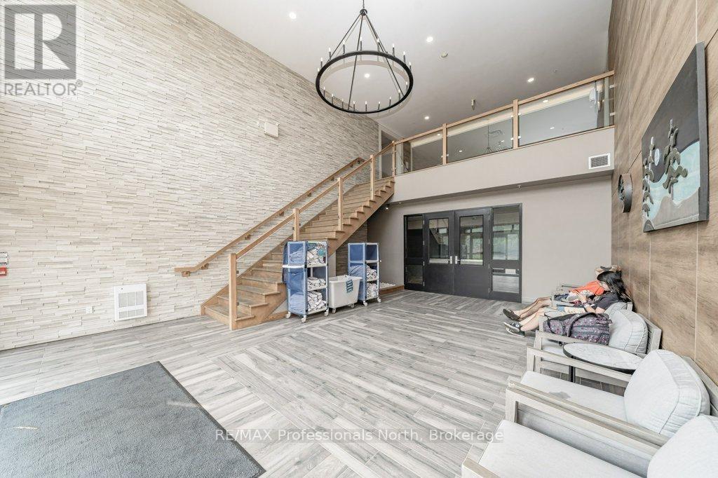 100 - 25 Pen Lake Point Road, Huntsville, Ontario  P1H 1A9 - Photo 3 - X12453981