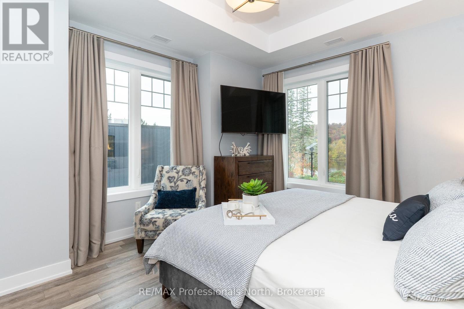 100 - 25 Pen Lake Point Road, Huntsville, Ontario  P1H 1A9 - Photo 5 - X12453981