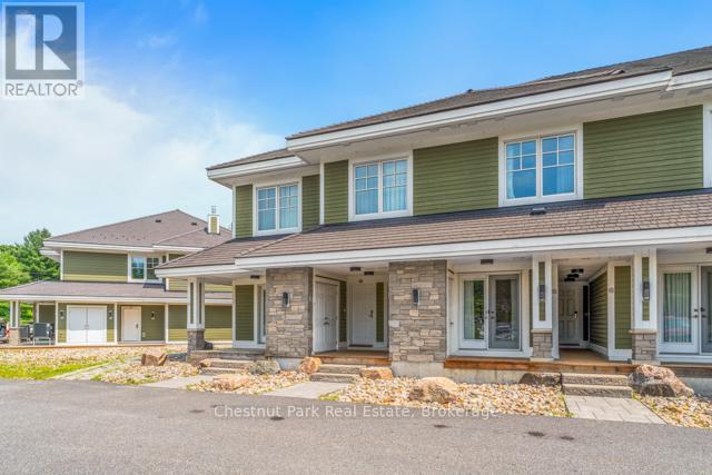 B#206 - 1869 Muskoka Road 118 Highway W, Muskoka Lakes, Ontario  P1L 1W8 - Photo 1 - X12456698