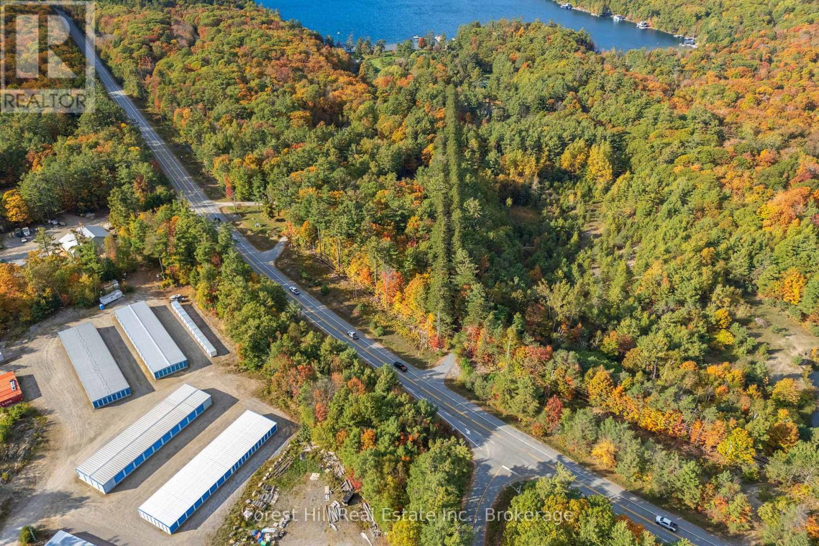 3864 Highway 118 W, Muskoka Lakes, Ontario  P0B 1J0 - Photo 2 - X12458892