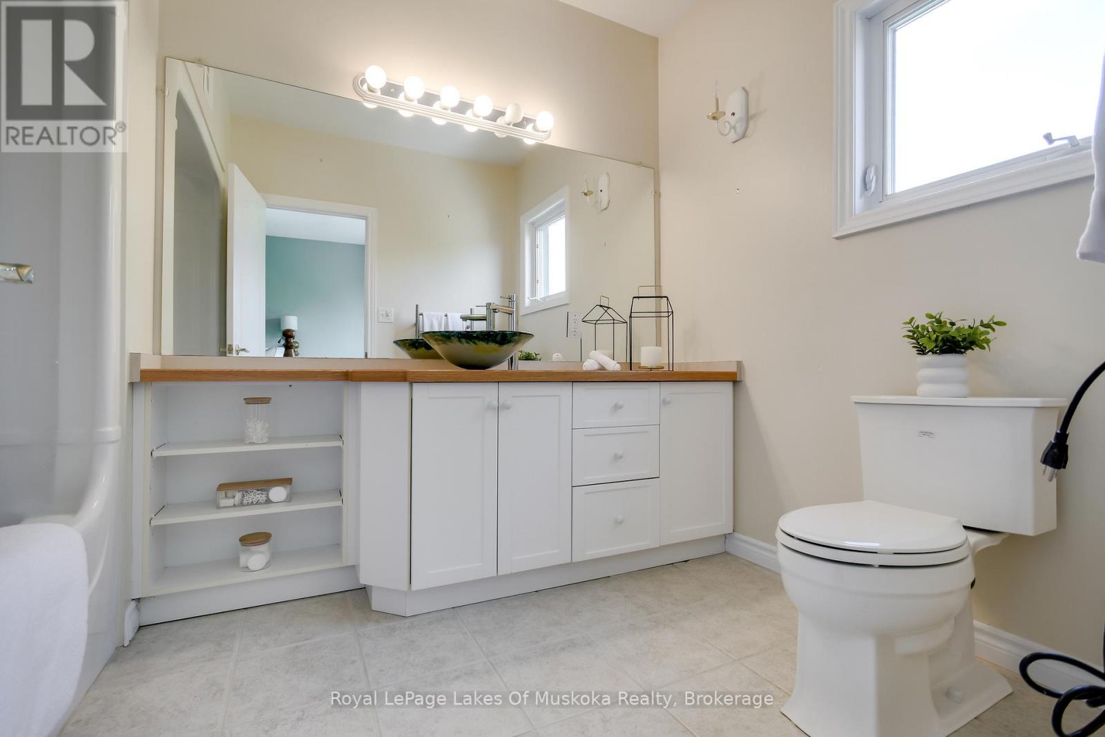 401 - 31 Dairy Lane, Huntsville, Ontario  P1H 1L7 - Photo 15 - X12507478