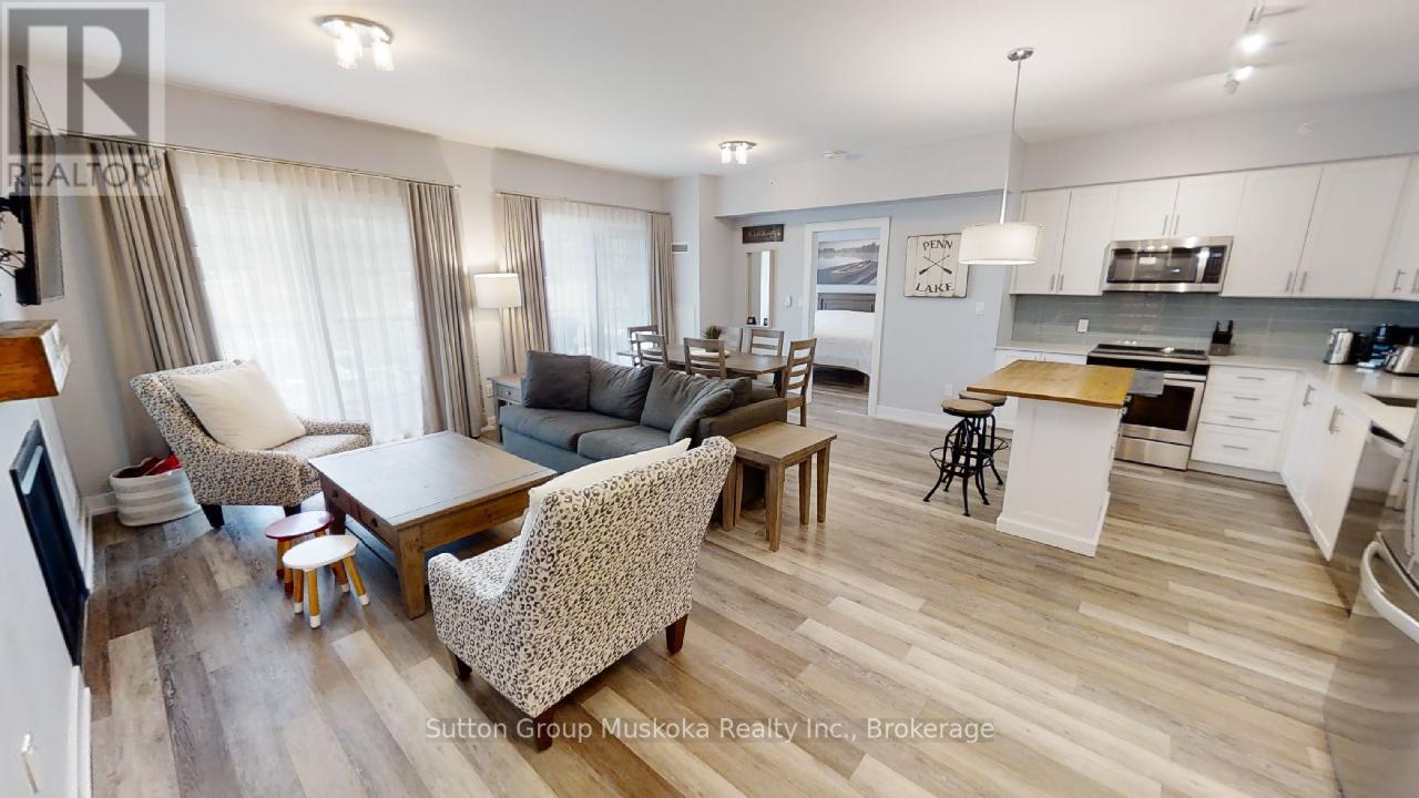 318 - 25 Pen Lake Point Road, Huntsville, Ontario  P1H 2E8 - Photo 1 - X12566740