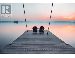 <div class="price">$3,445,000</div> 1016 Lawland Heights Road, Gravenhurst<br><div style="margin-bottom:8px;"><small>Cottage Vacations Real Estate Brokerage Inc.</small></div><div class='bed_bath'>5 Bed | 3 Bath</div>