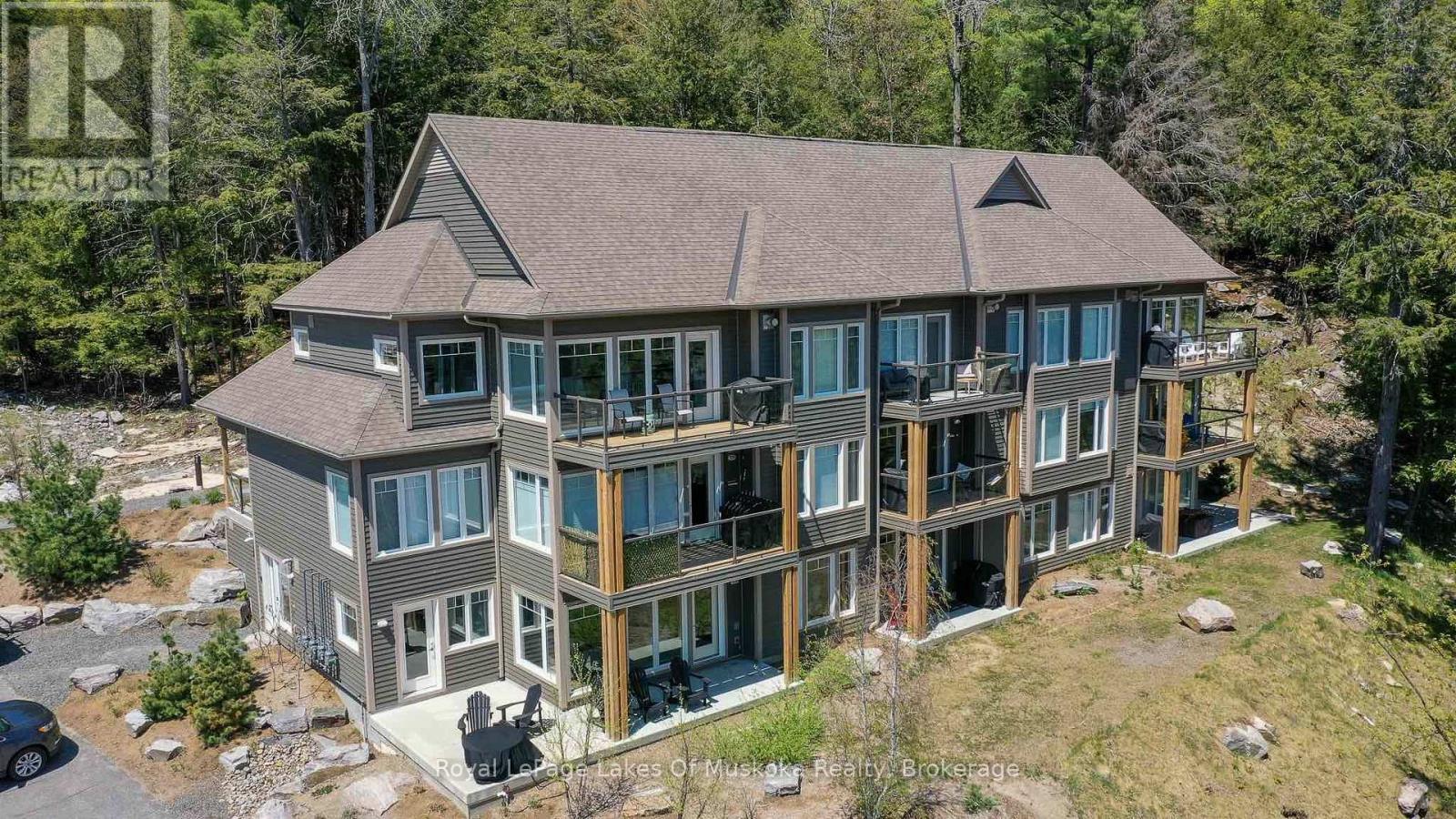 102 - 3 Tree Tops Lane, Huntsville, Ontario  P1H 0B8 - Photo 2 - X12850186