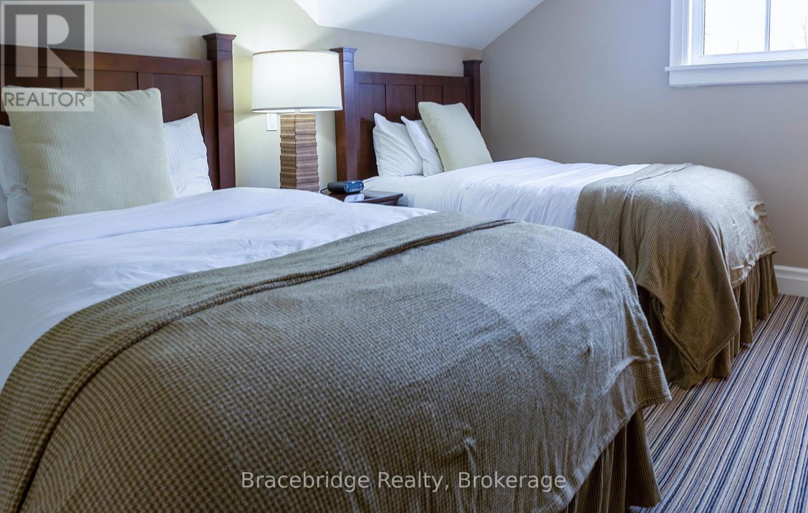 G104-D2 - 1869 Muskoka Road 118 Highway W, Muskoka Lakes, Ontario  P1L 1W8 - Photo 27 - X12857606