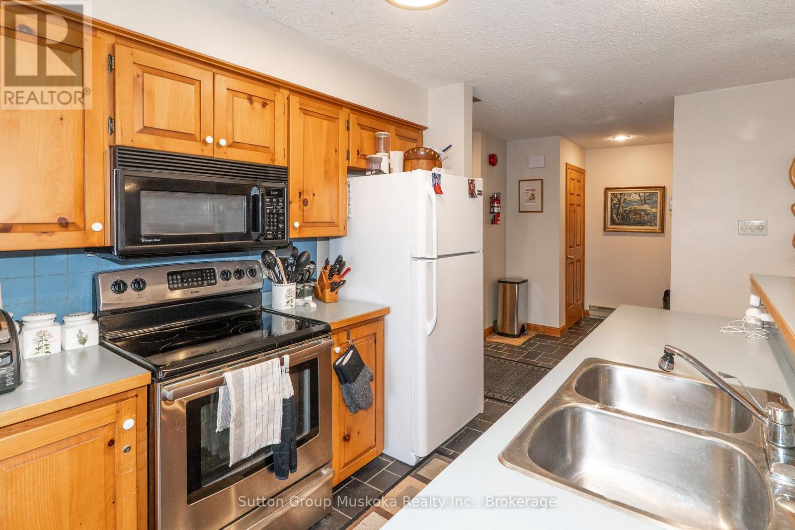 22-102 Oakridge - Deerhurst Resort Drive, Huntsville, Ontario  P1H 2E8 - Photo 6 - X12904142