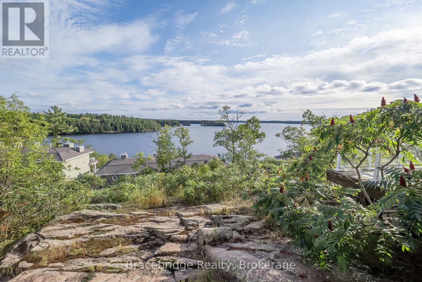 T301-C2 - 1869 Muskoka Rd 118 Highway W, Muskoka Lakes, Ontario  P1L 1W8 - Photo 26 - X12918586