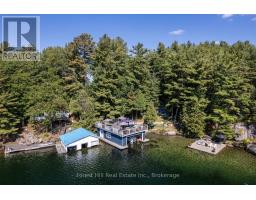 <div class="price">$1,295,000</div> 29sl4 Clifton Island, Muskoka Lakes<br><div style="margin-bottom:8px;"><small>Forest Hill Real Estate Inc.</small></div><div class='bed_bath'>5 Bed | 2 Bath</div>