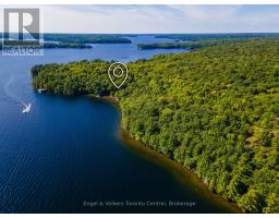 <div class="price">$8,999,000</div> 1246 Purdy Road, Muskoka Lakes<br><div style="margin-bottom:8px;"><small>Engel & Volkers Toronto Central</small></div>