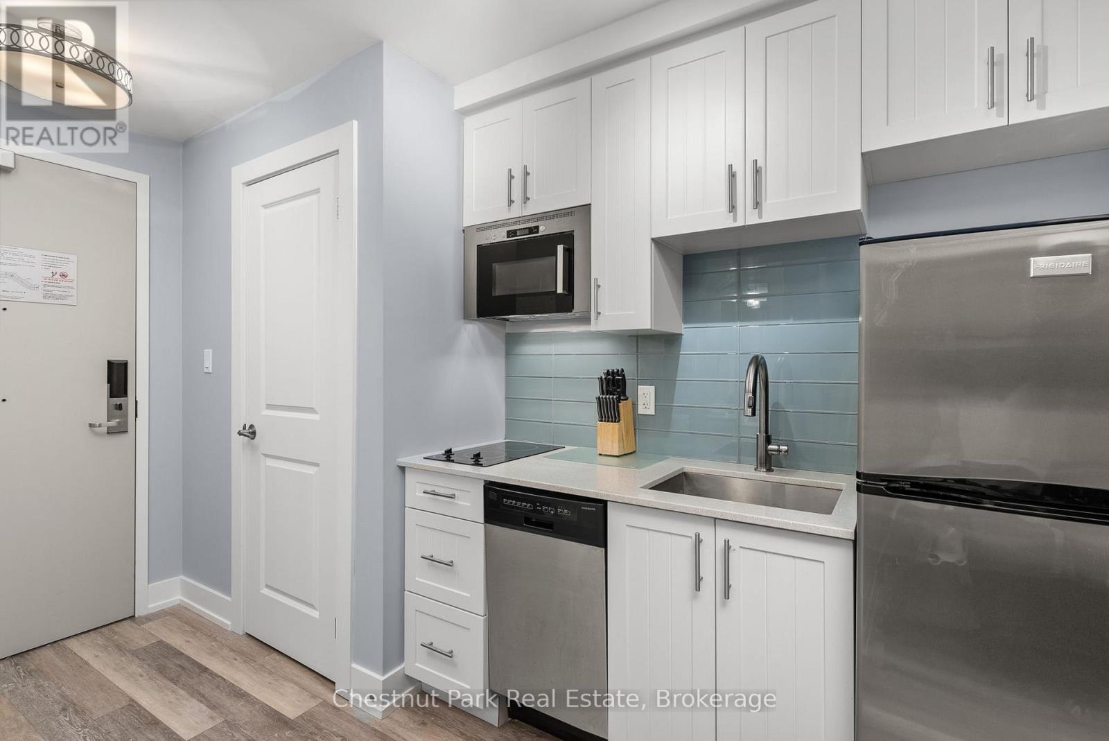 206 - 25 Pen Lake Point Road, Huntsville, Ontario  P1H 1A9 - Photo 7 - X12965954