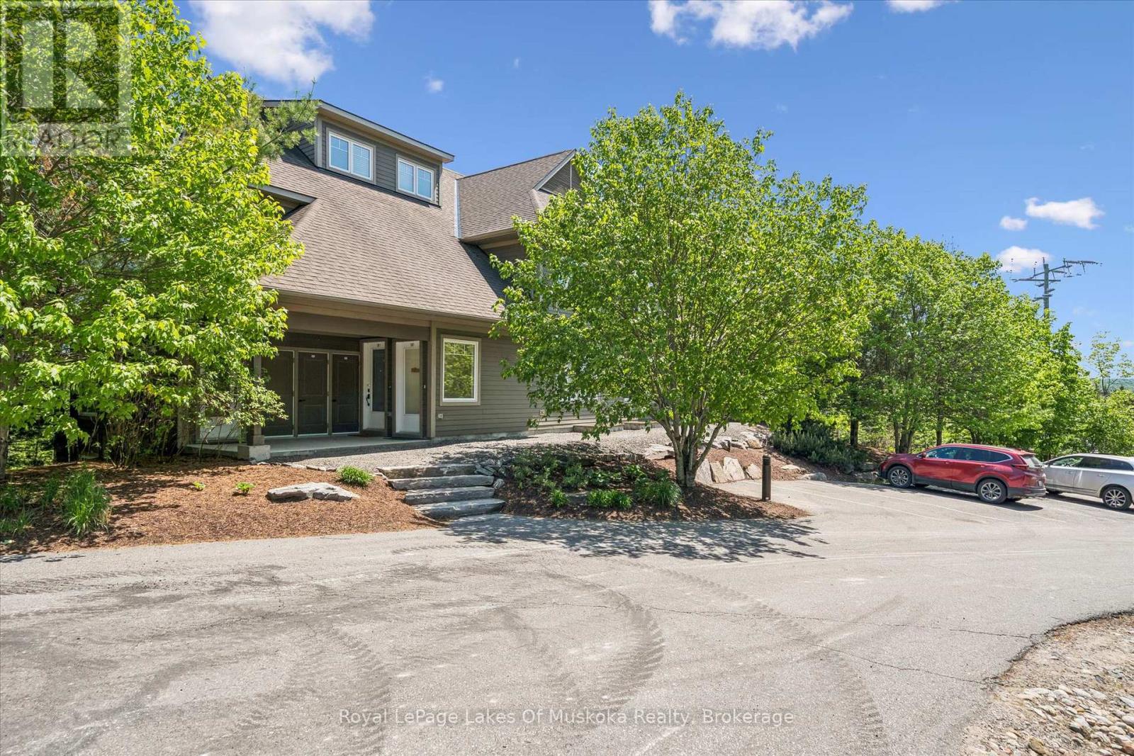 101 - 1 Tree Tops Lane, Huntsville, Ontario P1H 1A9 - Photo 1 - X13248702