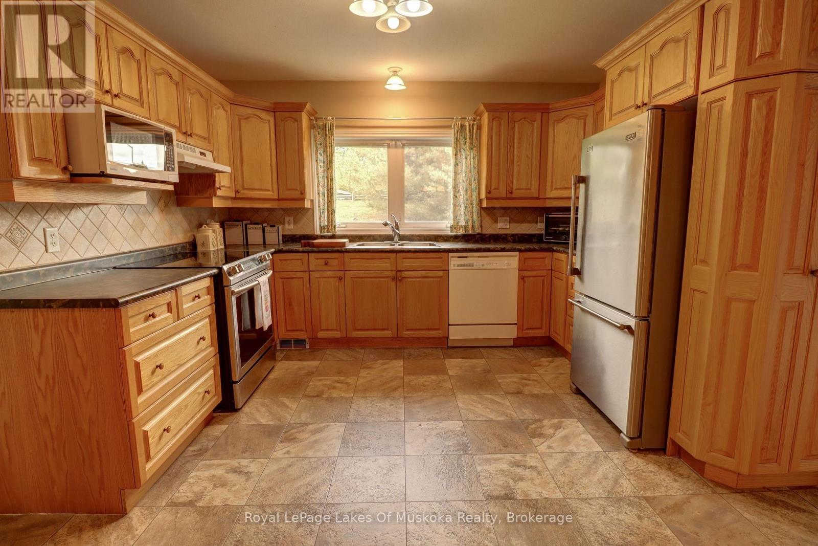 106 - 31 Dairy Lane, Huntsville, Ontario P1H 2L7 - Photo 4 - X13419994