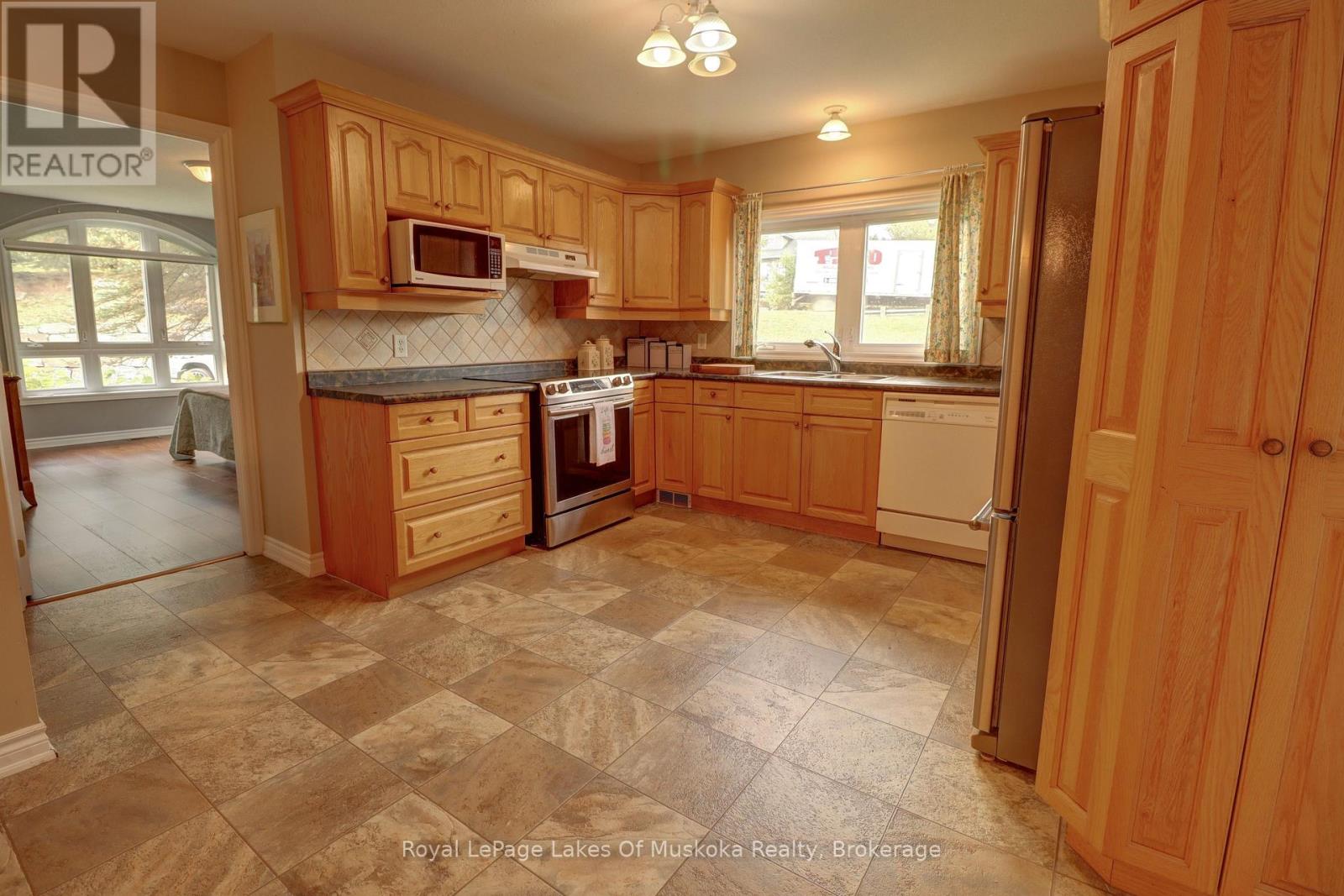106 - 31 Dairy Lane, Huntsville, Ontario P1H 2L7 - Photo 5 - X13419994