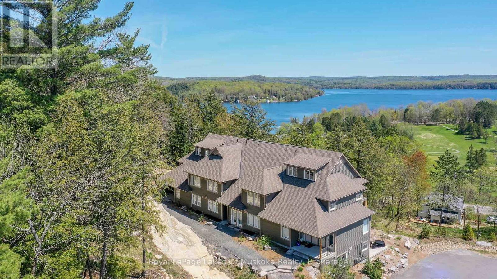102 - 3 Tree Tops Lane, Huntsville, Ontario P1H 0B8 - Photo 1 - X13424746