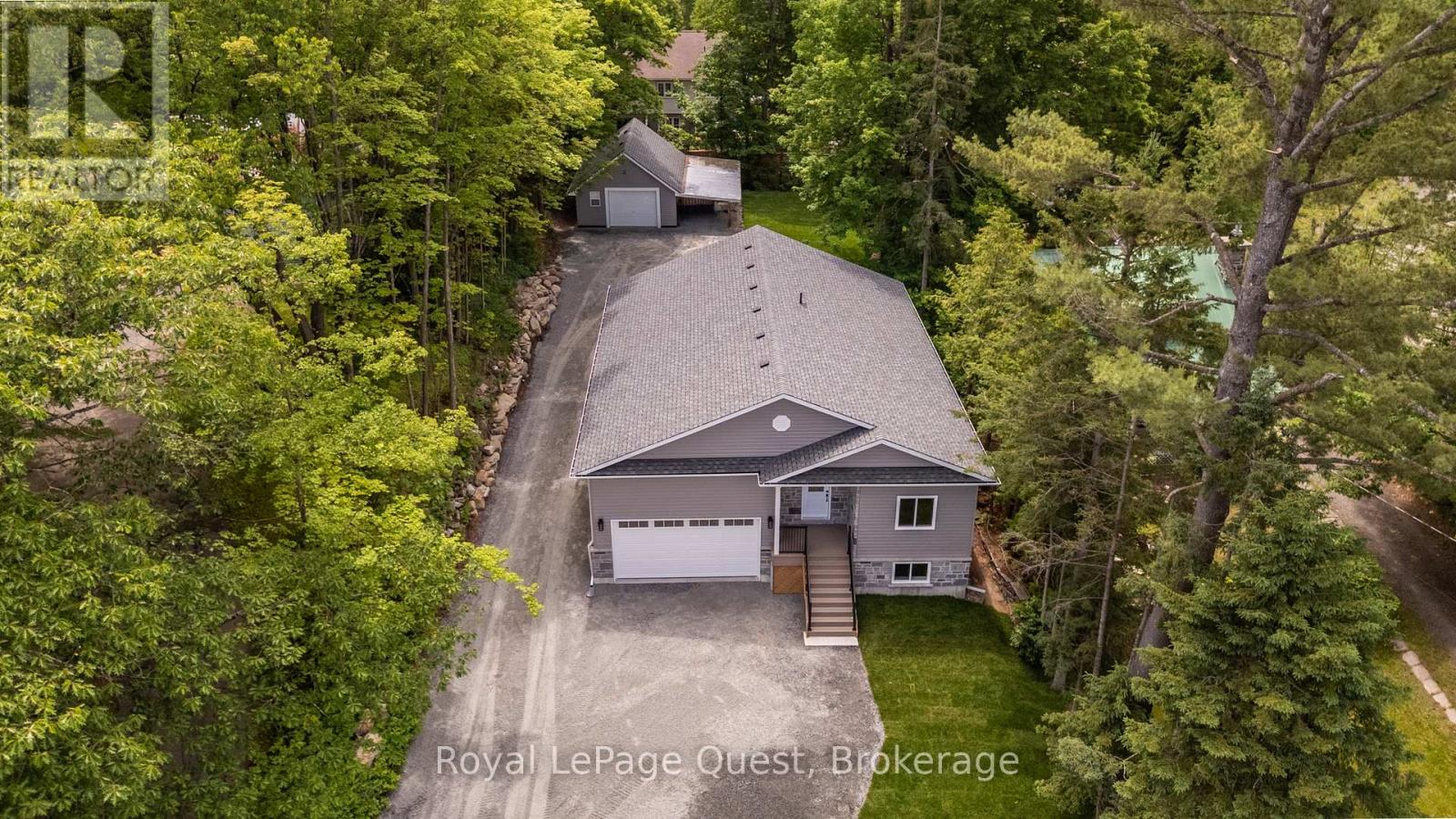 57 West Road W, Huntsville, Ontario  P1H 1L4 - Photo 1 - X13541932