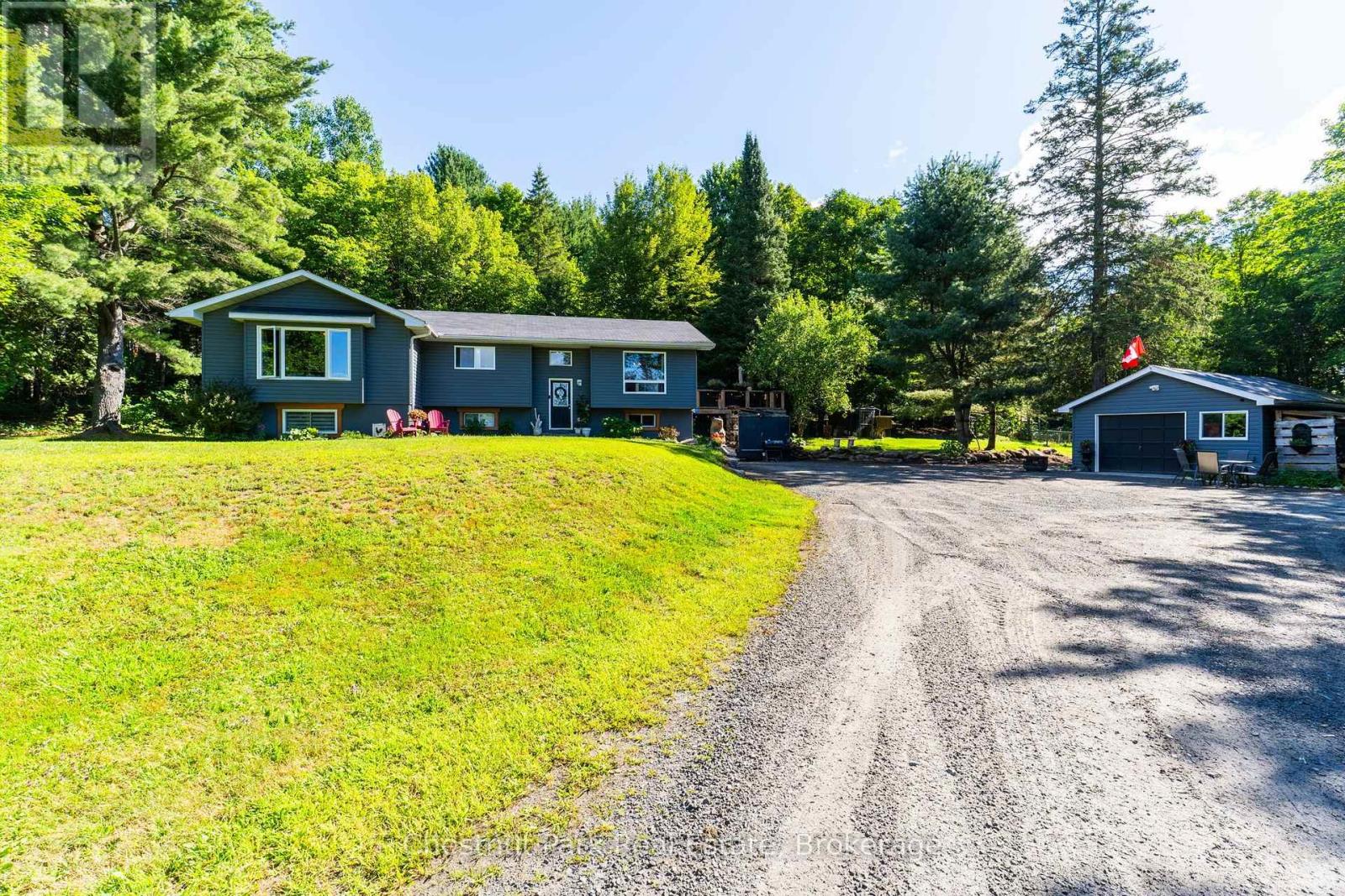 521 Old Muskoka Road, Huntsville, Ontario  P1H 0G8 - Photo 1 - X13696680