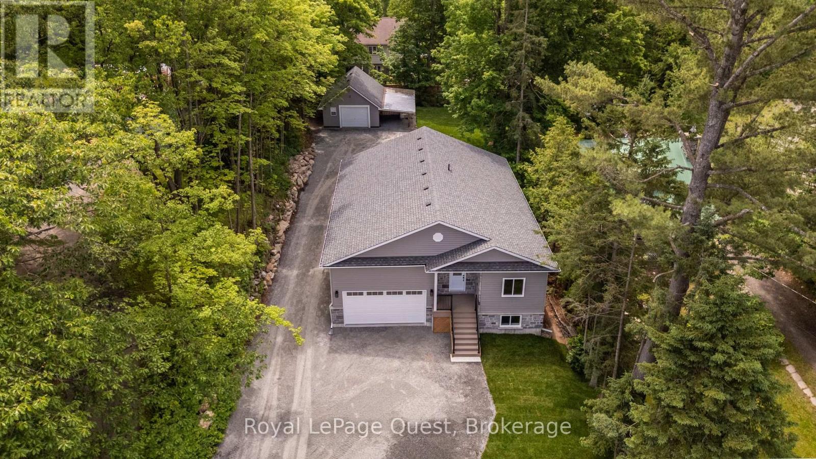 57 West Road W, Huntsville, Ontario  P1H 1L4 - Photo 1 - X13711074